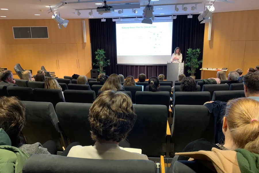 A person giving a presentation to an audience