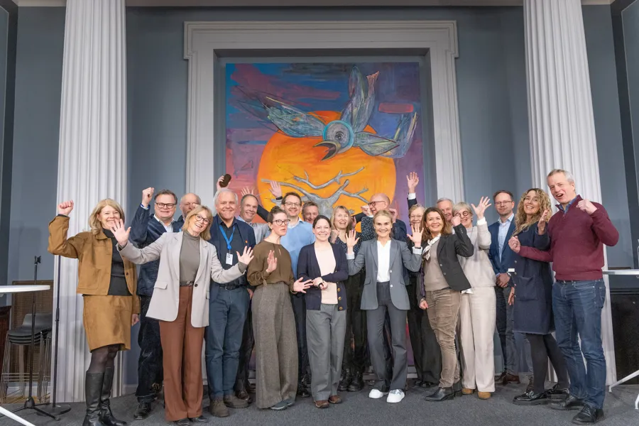 Gruppebilde av foredragsholdere på seminar