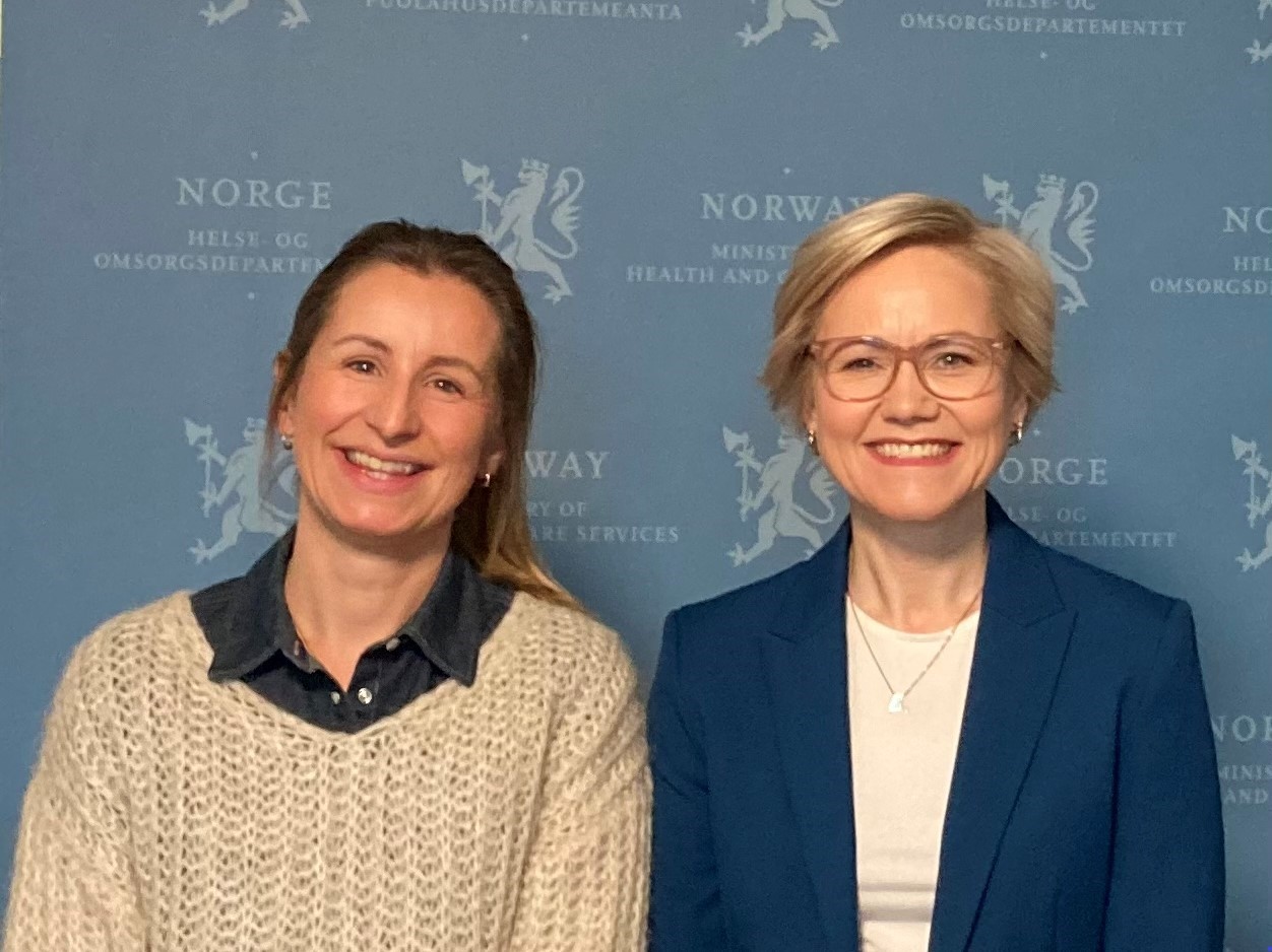 A couple of women smiling